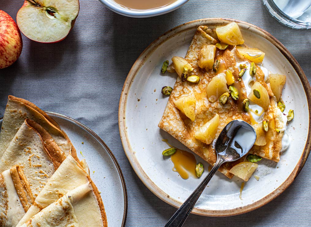 Plate of crepes filled with spicy apples